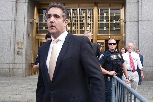 Michael Cohen leaves Federal court, Tuesday, Aug. 21, 2018, in New York. Cohen, has pleaded guilty to charges including campaign finance fraud stemming from hush money payments to porn actress Stormy Daniels and ex-Playboy model Karen McDougal. [Photo: AP/Mary Altaffer]